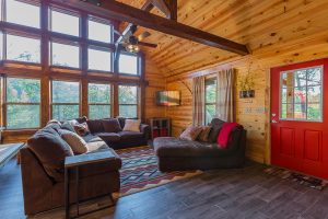 Living Area And Entrance Hideaway At Clear Sky Ridge Cabin Rentals Near Wolf Pen Gap In Mena Arkansas