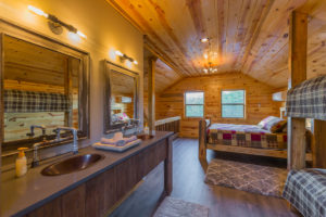 Upstairs Vanity And Queen Bed Hideaway At Clear Sky Ridge Cabin Rentals Near Wolf Pen Gap In Mena Arkansas